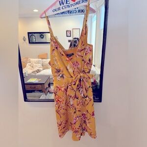 Express yellow floral, summer romper, elastic waist. Large brand new